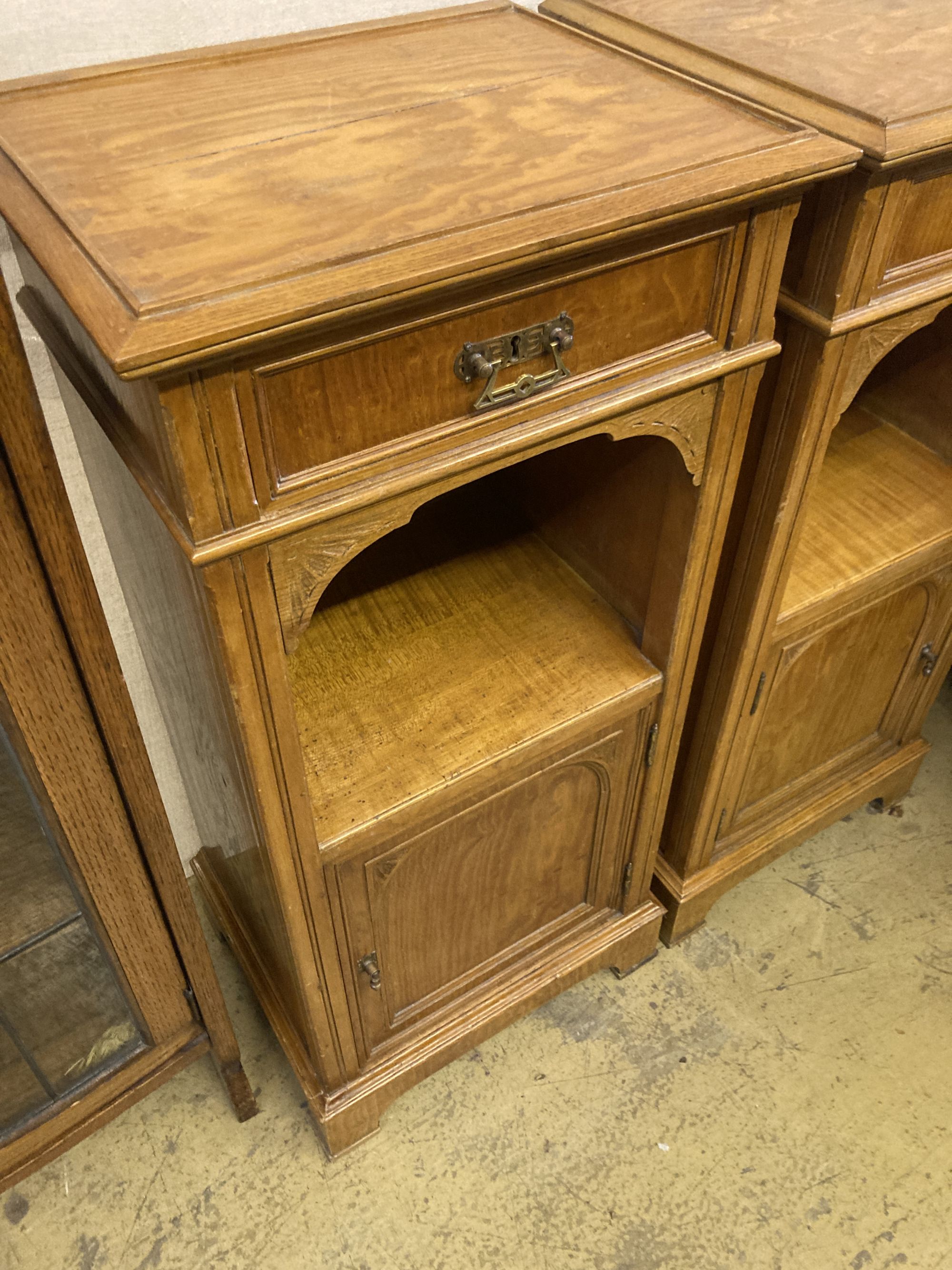 A pair of early 20th century satin walnut bedside cabinets, width 42cm, depth 34cm, height 91cm